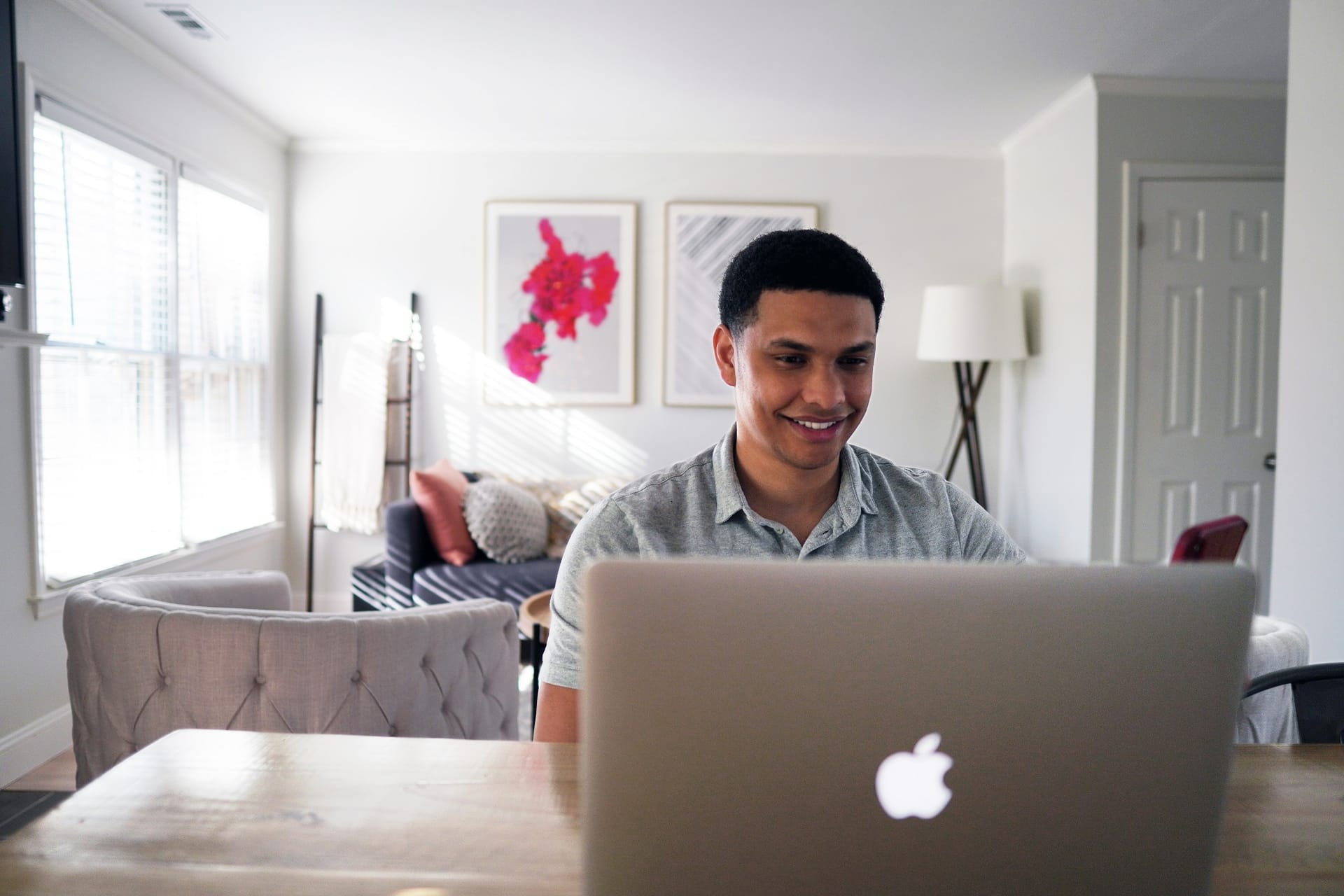 A smiling client relaxing after planning their finances